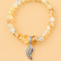 Bracelet en Citrine avec pendentif Aile d'ange (Protection, guidance, liberté)