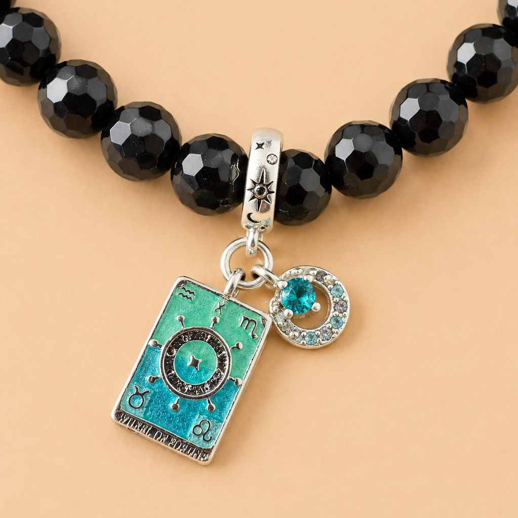 Bracelet en Onyx noir avec pendentif Roue de la fortune (Protection, chance)
